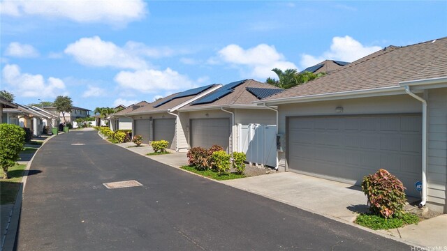 91-1322 Keoneula Blvd Unit 403, Ewa Beach, HI 96706 - view of asphalt road with a residential view