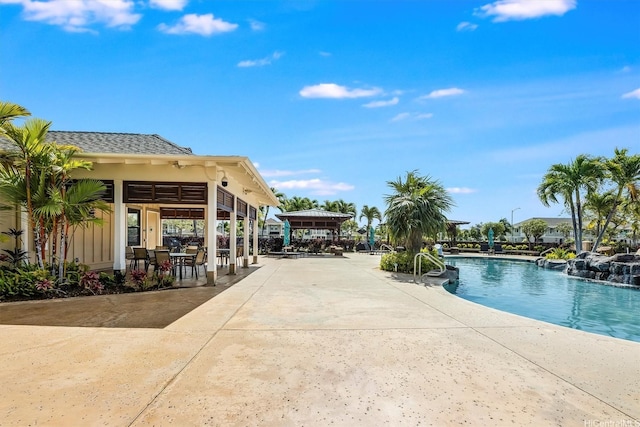 91-1322 Keoneula Blvd Unit 403, Ewa Beach, HI 96706 - community pool featuring a patio