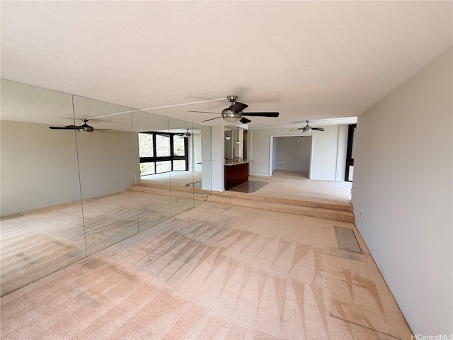 521 Hahaione St Unit 2-15L, Honolulu, HI 96825 - unfurnished room with light carpet and a ceiling fan
