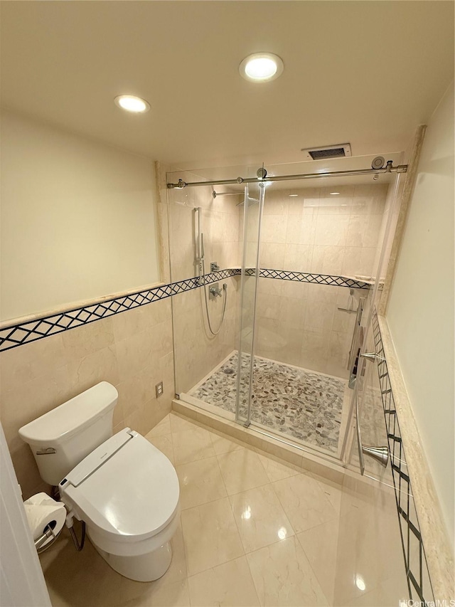 521 Hahaione St Unit 2-15L, Honolulu, HI 96825 - full bathroom featuring recessed lighting, toilet, a shower stall, and tile walls