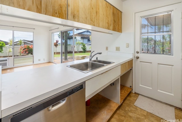 94-1199 Meleinoa Pl Unit 21C, Waipahu, HI 96797 - kitchen featuring a sink, light countertops, modern cabinets, and stainless steel dishwasher