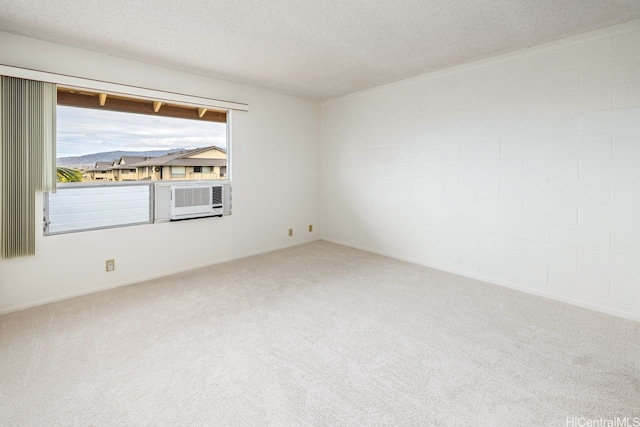 94-1199 Meleinoa Pl Unit 21C, Waipahu, HI 96797 - unfurnished room featuring carpet, a textured ceiling, and cooling unit