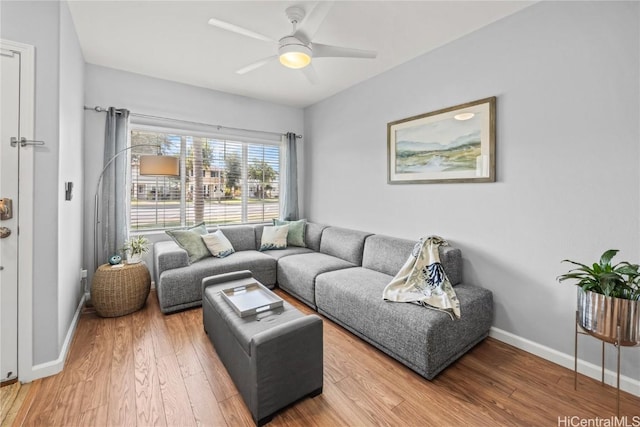 91-1200 Kaileolea Dr Unit 2K2, Ewa Beach, HI 96706 - living room featuring ceiling fan, baseboards, and wood finished floors