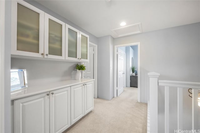 91-1200 Kaileolea Dr Unit 2K2, Ewa Beach, HI 96706 - corridor with attic access, light colored carpet, and an upstairs landing