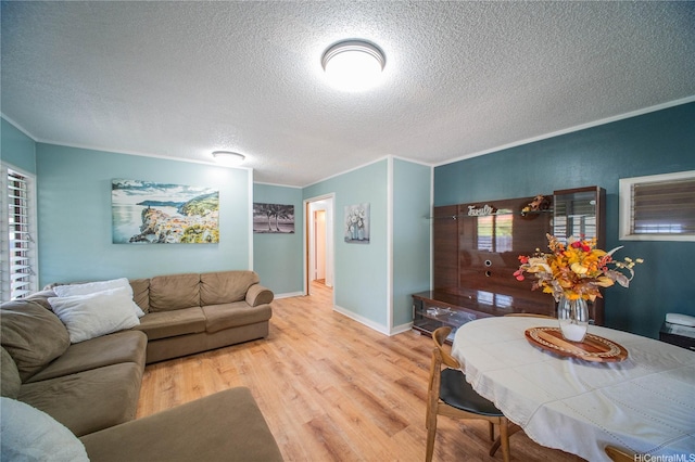 66-925 Ulihi Pl, Waialua, HI 96791 - living area featuring a textured ceiling, wood finished floors, healthy amount of natural light, baseboards, and crown molding