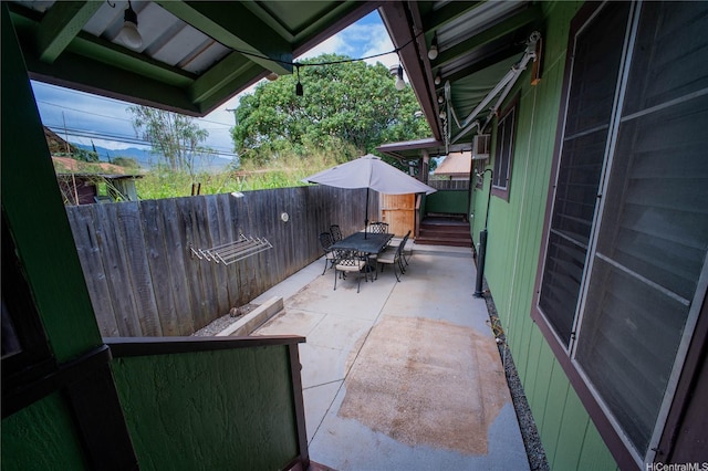 66-925 Ulihi Pl, Waialua, HI 96791 - view of patio with outdoor dining area and a fenced backyard