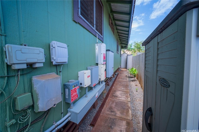 66-925 Ulihi Pl, Waialua, HI 96791 - view of side of home featuring fence