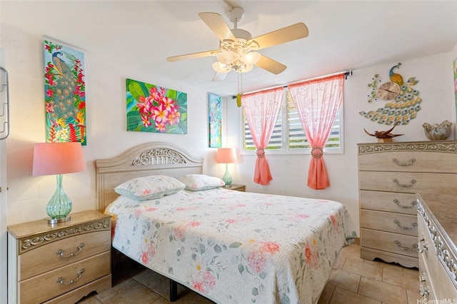 85-175 Farrington Hwy Unit A402, Waianae, HI 96792 - tiled bedroom with a ceiling fan