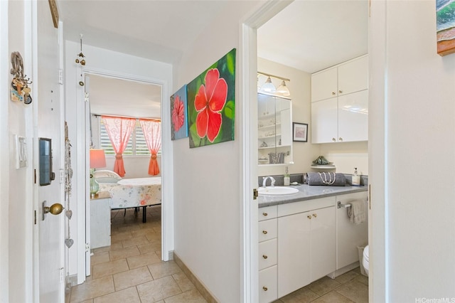 85-175 Farrington Hwy Unit A402, Waianae, HI 96792 - ensuite bathroom featuring vanity and tile patterned floors