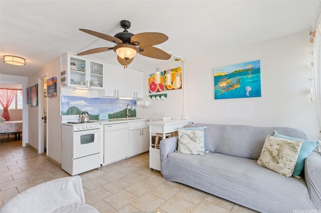 85-175 Farrington Hwy Unit A402, Waianae, HI 96792 - living room featuring a ceiling fan and light tile patterned floors
