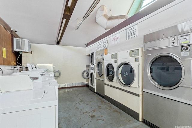 85-175 Farrington Hwy Unit A402, Waianae, HI 96792 - community laundry featuring washer and clothes dryer and a wall mounted AC