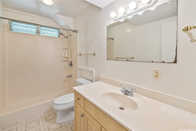 bathroom with toilet, vanity, and walk in shower