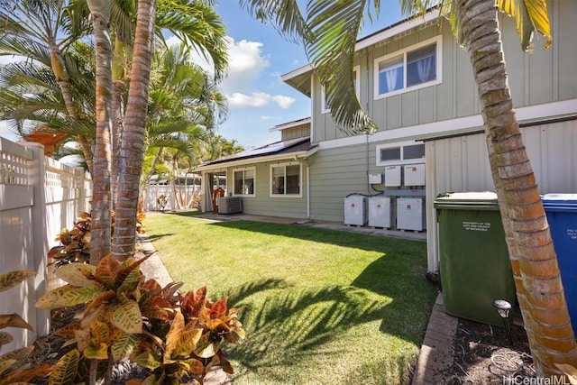 view of yard featuring a fenced backyard and cooling unit