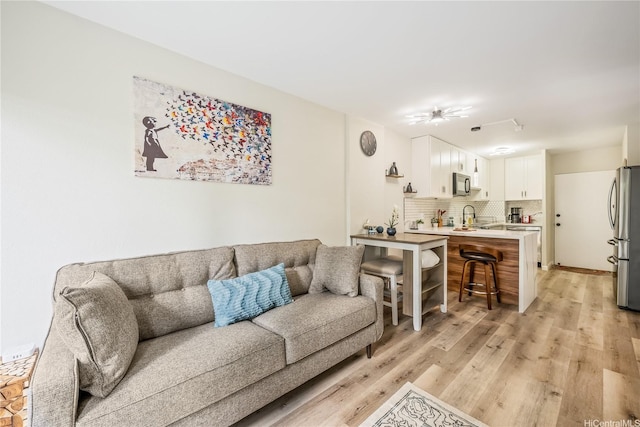 222 Kaiulani Ave Unit 208, Honolulu, HI 96815 - living area featuring light wood-type flooring