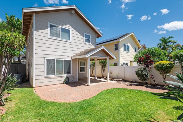 91-1092 Kaileolea Dr, Ewa Beach, HI 96706 - back of house featuring a patio area and a fenced backyard