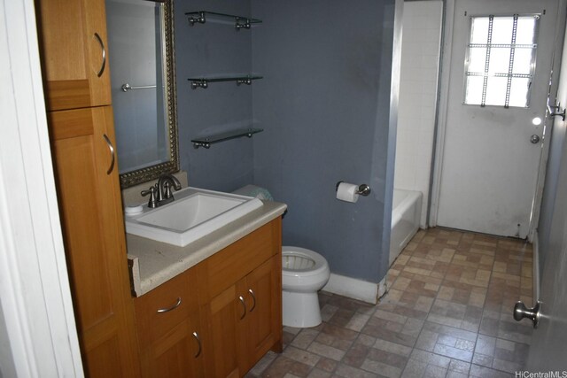1516 Emerson St Unit 104, Honolulu, HI 96813 - full bathroom featuring toilet, vanity, and baseboards