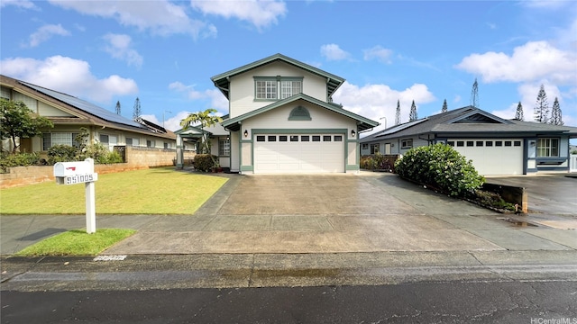 traditional-style home with concrete driveway and a front lawn