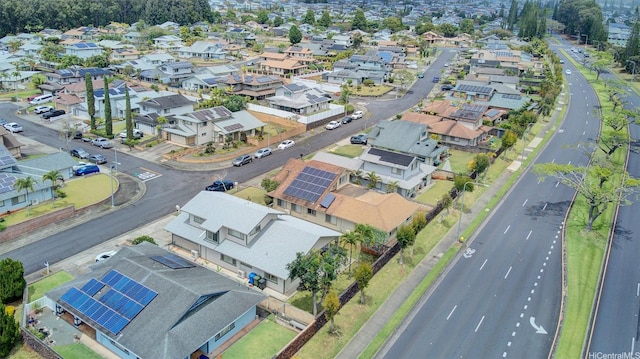 birds eye view of property with a residential view