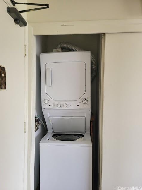 2140 Kuhio Ave Unit 801, Honolulu, HI 96815 - washroom featuring stacked washing machine and dryer