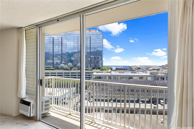 750 Amana St Unit 1111, Honolulu, HI 96814 - interior space with a healthy amount of sunlight, a view of city, floor to ceiling windows, and a textured ceiling