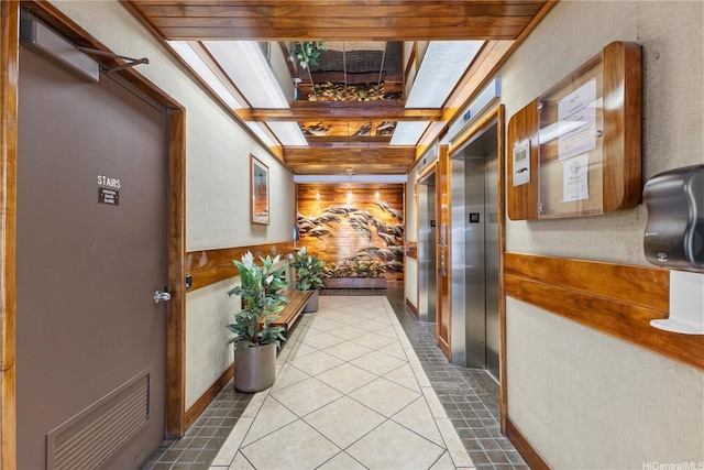 750 Amana St Unit 1111, Honolulu, HI 96814 - hallway with light tile patterned flooring and elevator