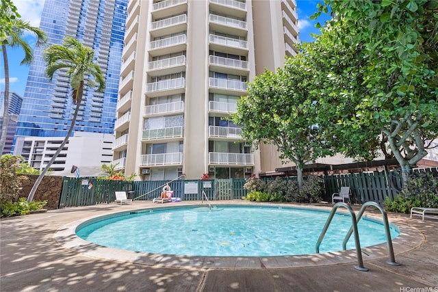 750 Amana St Unit 1111, Honolulu, HI 96814 - view of pool featuring fence