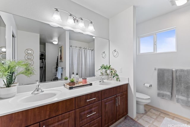 91-1001 Keaunui Dr Unit 35, Ewa Beach, HI 96706 - bathroom featuring double vanity and toilet