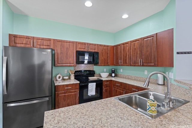 91-1001 Keaunui Dr Unit 35, Ewa Beach, HI 96706 - kitchen with black appliances, light countertops, and recessed lighting