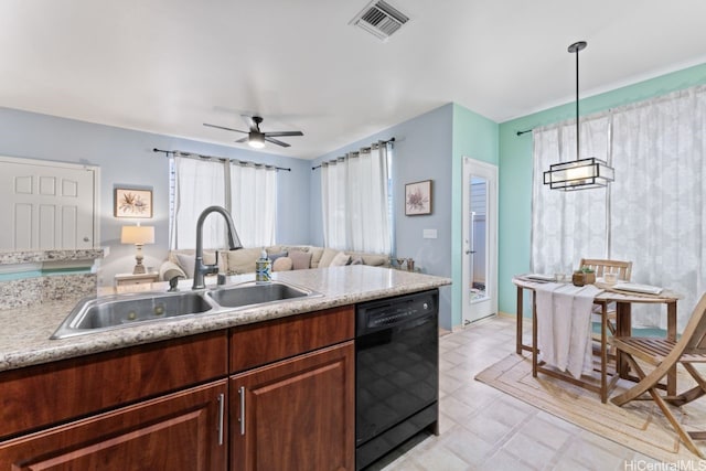 91-1001 Keaunui Dr Unit 35, Ewa Beach, HI 96706 - kitchen with black dishwasher, ceiling fan, open floor plan, light countertops, and light floors
