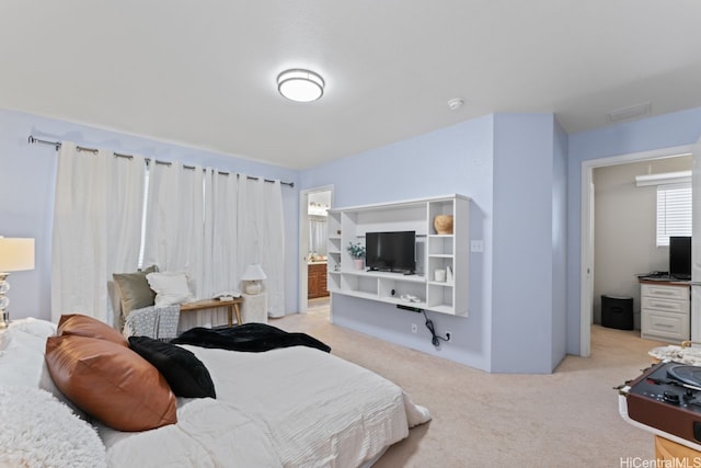 91-1001 Keaunui Dr Unit 35, Ewa Beach, HI 96706 - bedroom featuring light colored carpet and ensuite bath