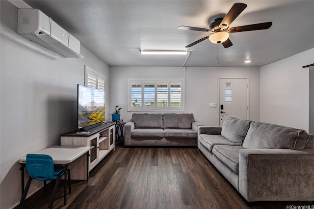 living room with dark wood finished floors and ceiling fan
