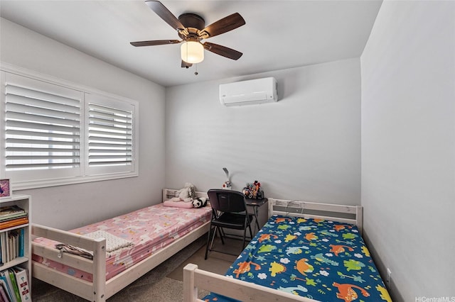 bedroom with a ceiling fan, carpet flooring, and a wall mounted AC