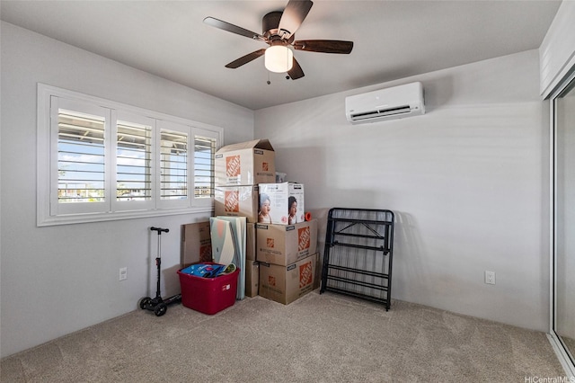 storage area with a ceiling fan and an AC wall unit