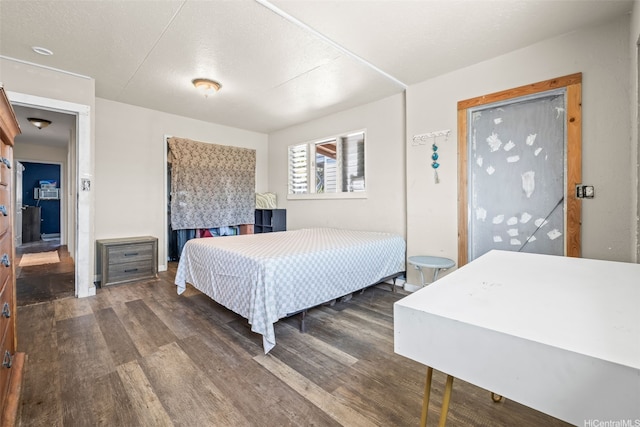 54-266 Kawaihemo Pl, Hauula, HI 96717 - bedroom featuring dark wood-style floors