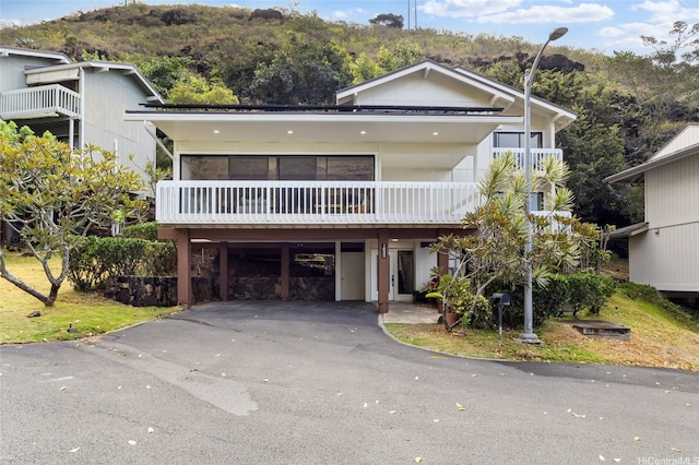 1623 Kalaniuka Way Unit 43, Honolulu, HI 96821 - view of front facade featuring a carport and driveway