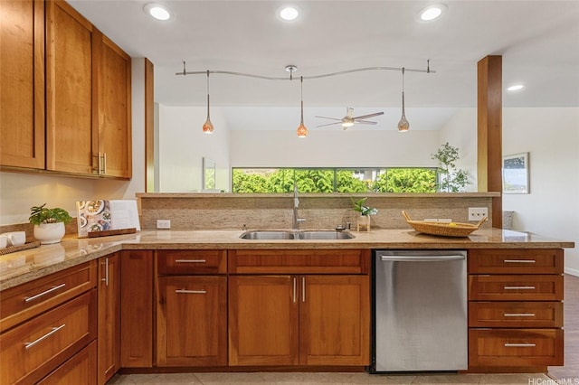1623 Kalaniuka Way Unit 43, Honolulu, HI 96821 - kitchen with stainless steel dishwasher, light stone counters, ceiling fan, brown cabinetry, and pendant lighting