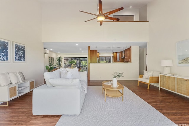 1623 Kalaniuka Way Unit 43, Honolulu, HI 96821 - living area featuring a high ceiling, wood finished floors, a ceiling fan, a wall unit AC, and recessed lighting