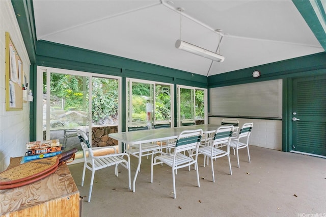 1623 Kalaniuka Way Unit 43, Honolulu, HI 96821 - sunroom / solarium with outdoor dining area, vaulted ceiling, and concrete block wall