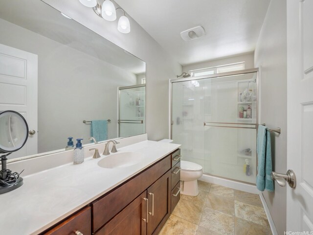 91-1483 Loiloi Loop, Ewa Beach, HI 96706 - bathroom featuring a stall shower, toilet, vanity, and baseboards
