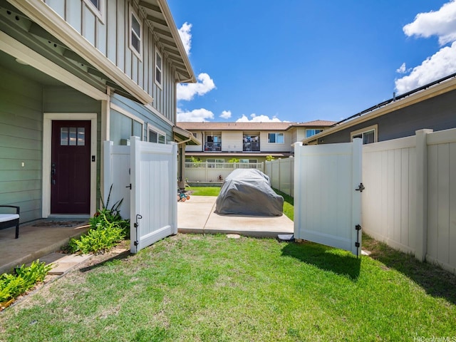 91-1483 Loiloi Loop, Ewa Beach, HI 96706 - view of yard featuring a patio and a gate