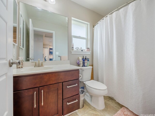 91-1483 Loiloi Loop, Ewa Beach, HI 96706 - full bath with toilet, vanity, tile patterned floors, and curtained shower