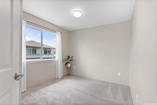 empty room with carpet flooring