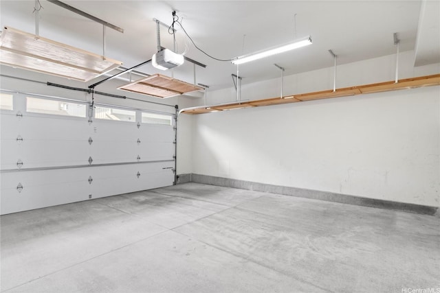 91-1159 Kamakana St Unit 829, Ewa Beach, HI 96706 - garage featuring a garage door opener and baseboards