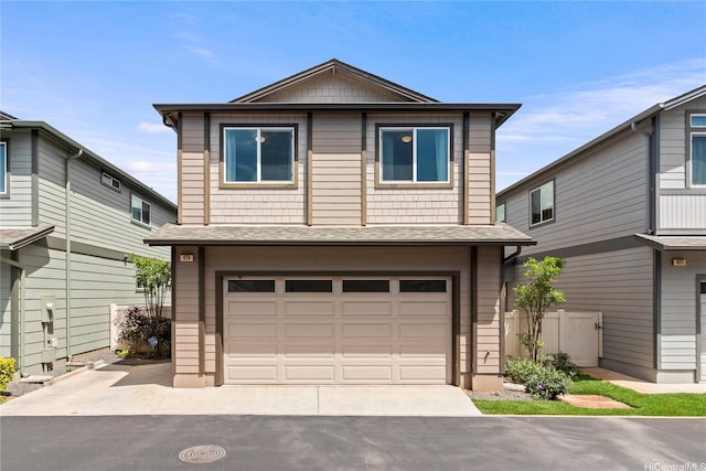 91-1159 Kamakana St Unit 829, Ewa Beach, HI 96706 - view of front facade with a garage, asphalt driveway, and roof with shingles