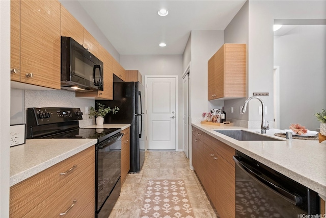 91-1159 Kamakana St Unit 829, Ewa Beach, HI 96706 - kitchen featuring black appliances, a sink, light countertops, and recessed lighting