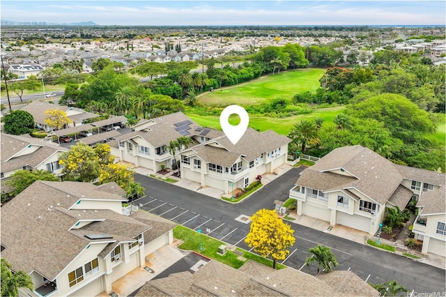 bird's eye view with a residential view and view of golf course