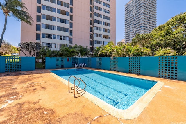 1031 Ala Napunani St Unit 401, Honolulu, HI 96818 - pool featuring fence
