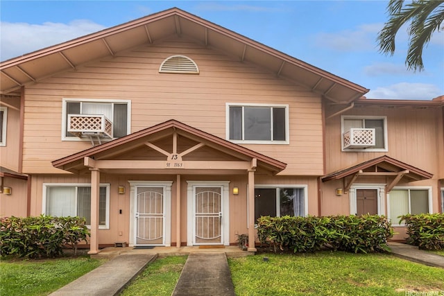 91-1163 Kamaaha Loop Unit 13C, Kapolei, HI 96707 - townhome / multi-family property with a front yard