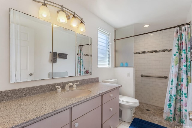 1315 Onioni St, Kailua, HI 96734 - full bathroom featuring toilet, vanity, tiled shower, recessed lighting, and tile patterned floors