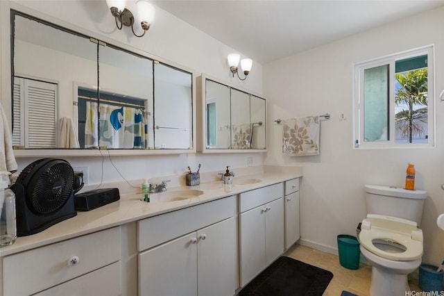 1315 Onioni St, Kailua, HI 96734 - full bathroom featuring double vanity, toilet, and baseboards